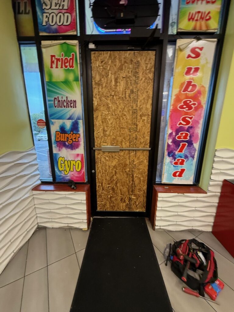 Broken Glass Door Board Up